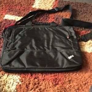 Think pad. Black shoulder bag with red accents